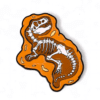 PIN ESQUELETO DINOSAURIO ROCA NARANJA